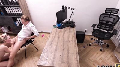 Lily Blossom's hidden assets: A loan4k tease with a busty office babe