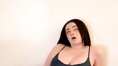 Watch this hot babe tease her glass dildo with her favorite toys