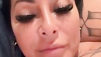 Kiara Mia gets her huge boobs drilled by a fan while he watches in awe
