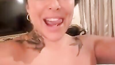 Kiara Mia gets her huge boobs drilled by a fan while he watches in awe