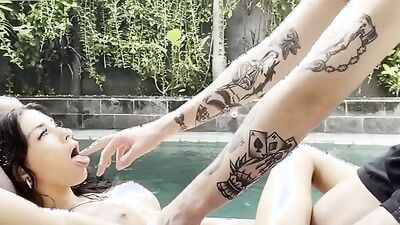 Watch this busty brunette babe with fake tits get wild outdoor with her massive tits