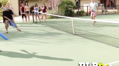 Busty swinger babe is naked having oral sex in the pool.
