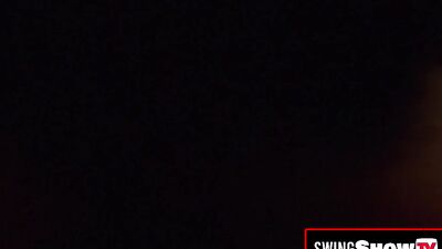 Hot swinger brunettes are having softcore sex in a messy and naughty orgy.