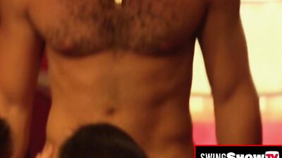 Hot swinger brunettes are having softcore sex in a messy and naughty orgy.