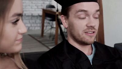 Two college graduates are enjoying intimate time after their final class