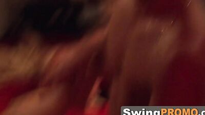 Swinging couples are sharing their testimonials before engaging in a passionate midnight orgy