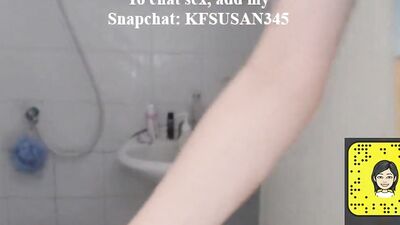 Woman is filming herself while being naked in a bathroom and putting on a lotion