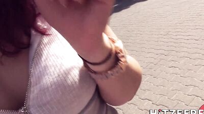 Big ass redhead with a shaved pussy has sex in a public place