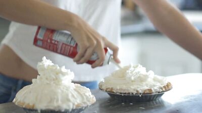 Two teen girls are including food in their lesbian sex games