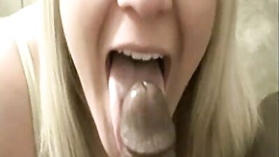 Blonde minx is filling her mouth with a BBC in this amateur flick