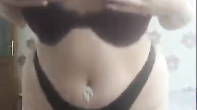Amateur woman is posing in sexy black panties for her webcam show