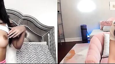 Two webcam hussies are rubbing their twats for one another during a lockdown