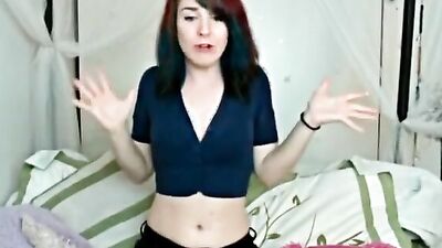 Punkish chick is about to help herself with a sex toy while masturbating
