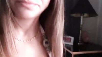 A close-up on an amateur lady while she's stuffing her mouth with a thick johnson