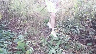 Amateur woman in a lovely dress is enjoying outdoor sex with her hubby