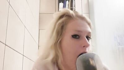 Busty amateur MILF is squeezing her big boobs for you while in a bathroom