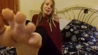 Blonde amateur babe wants you to enjoy and worship her smelly feet
