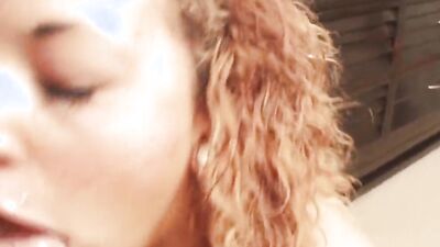 POV close-up on an amateur minx while she's giving a blowjob and licking balls