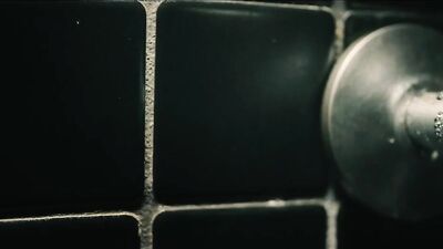 Sweet brunette is filmed using a bathroom by a hidden camera