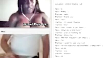 Amateur ebony cougar is teasing a white bloke with her boobs while he's masturbating