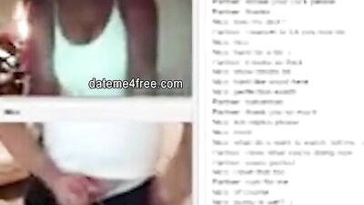 Amateur ebony cougar is teasing a white bloke with her boobs while he's masturbating