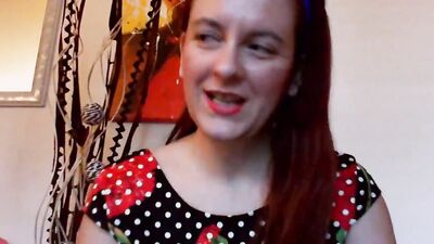 Big ass redhead woman is getting naked and playing with huge balloons
