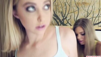 Two aroused blondes are taking turns on a stiff cock in a threesome