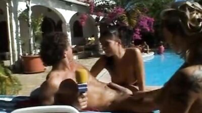 Big natural tits are bouncing in an outdoor banging session by the pool
