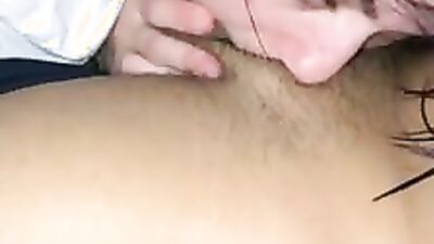 A close-up on an amateur harlot while she's giving a very messy blowjob