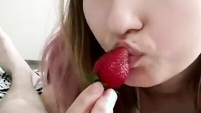 Close-up on a cute amateur chick while she's orally pleasing her boyfriend