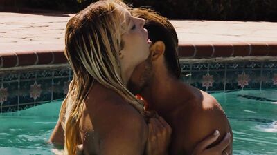 Aroused couple enjoys outdoor sex in and around the pool
