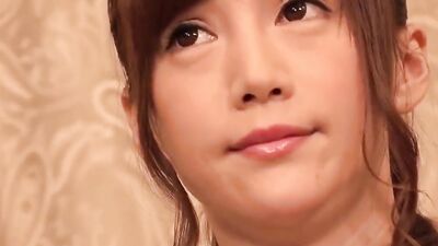 Pretty Asian girl is followed by a camera into the bathroom