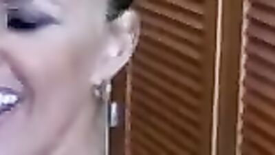 Lovely blonde MILF enjoys interracial lovemaking in a hotel room