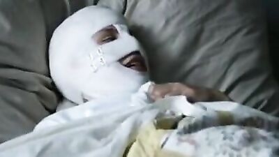 Woman in bandages enjoys sensual lesbian love with her lady friend