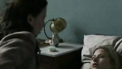 Woman in bandages enjoys sensual lesbian love with her lady friend