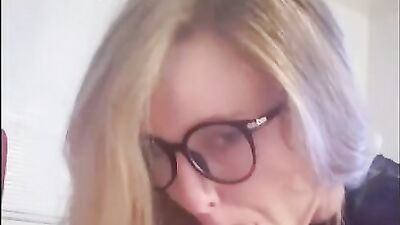 Cute amateur chick with glasses gives a cock sucking treatment