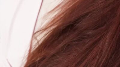 Lonely ginger doll is filmed while using a magic wand outdoors