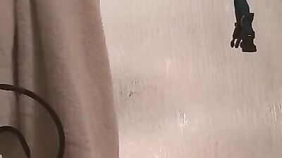 Obese amateur woman films herself while masturbating in a bathroom