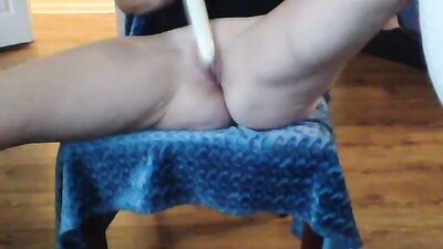Amateur blonde performs a striptease before toying her bald snatch