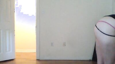Amateur blonde performs a striptease before toying her bald snatch
