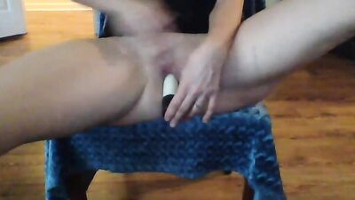 Amateur blonde performs a striptease before toying her bald snatch