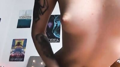 Slutty inked camgirl is using a big sex toy for pussy stuffing pleasure