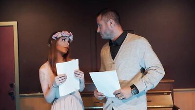 Skinny redhead girl gets banged on a piano by her teacher